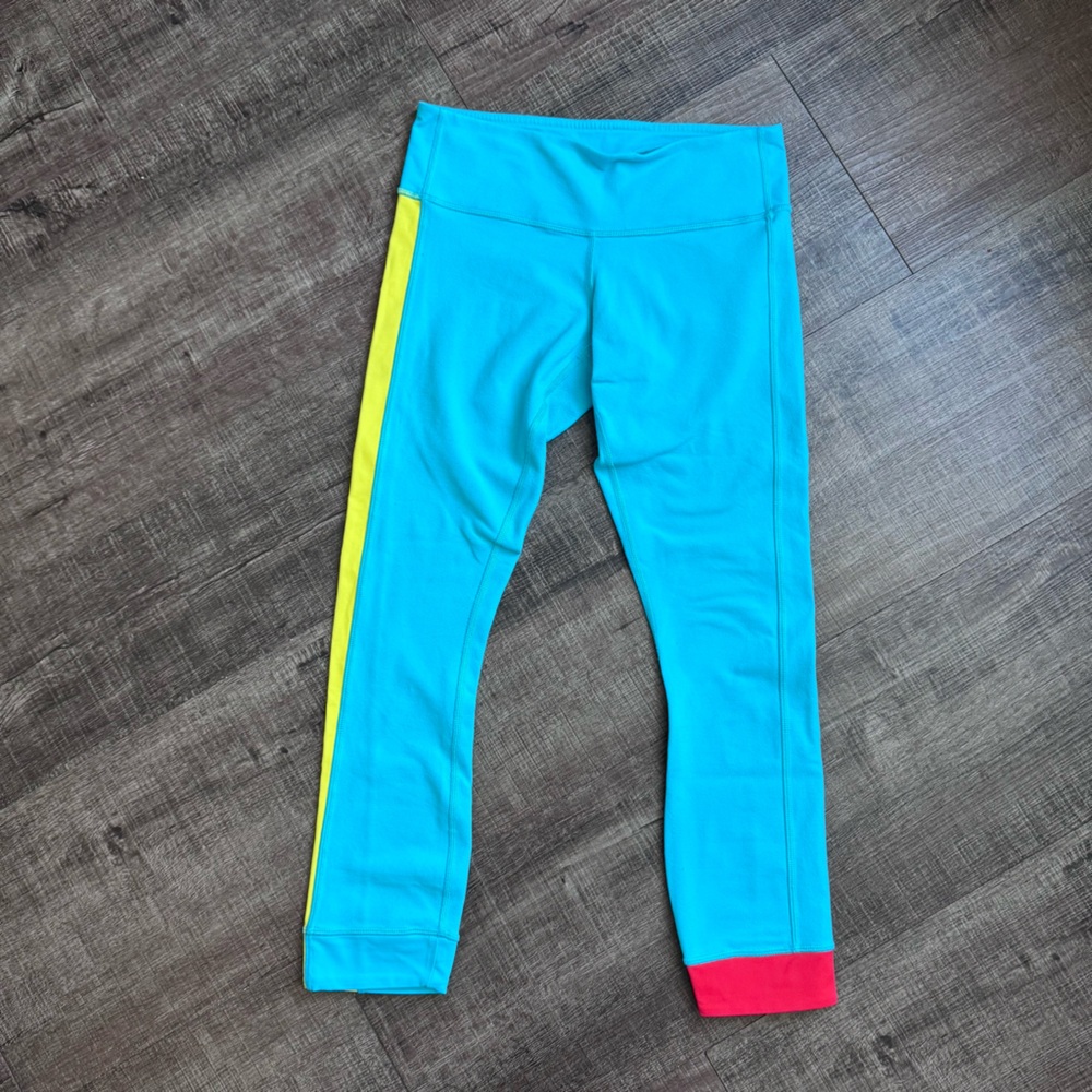 lululemon athletica Turquoise Leggings with Yellow Stripe and Red Hem